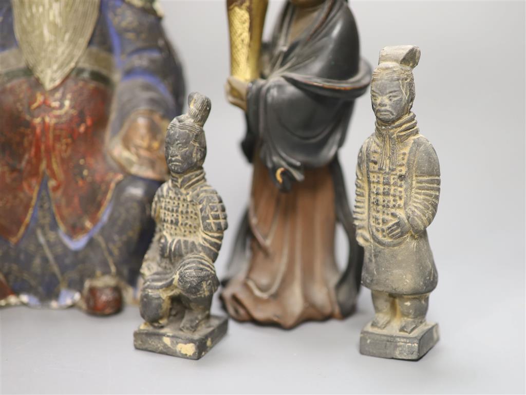 Five various Chinese pottery figures, a composite figure and a painted wood figure, tallest 20cm